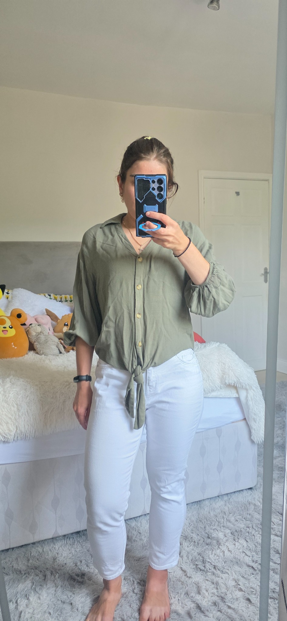 Khaki-green Primark tie-front shirt styled with white jeans